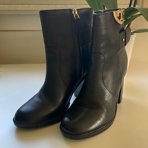 Used black Tory Burch bootie with gold logo